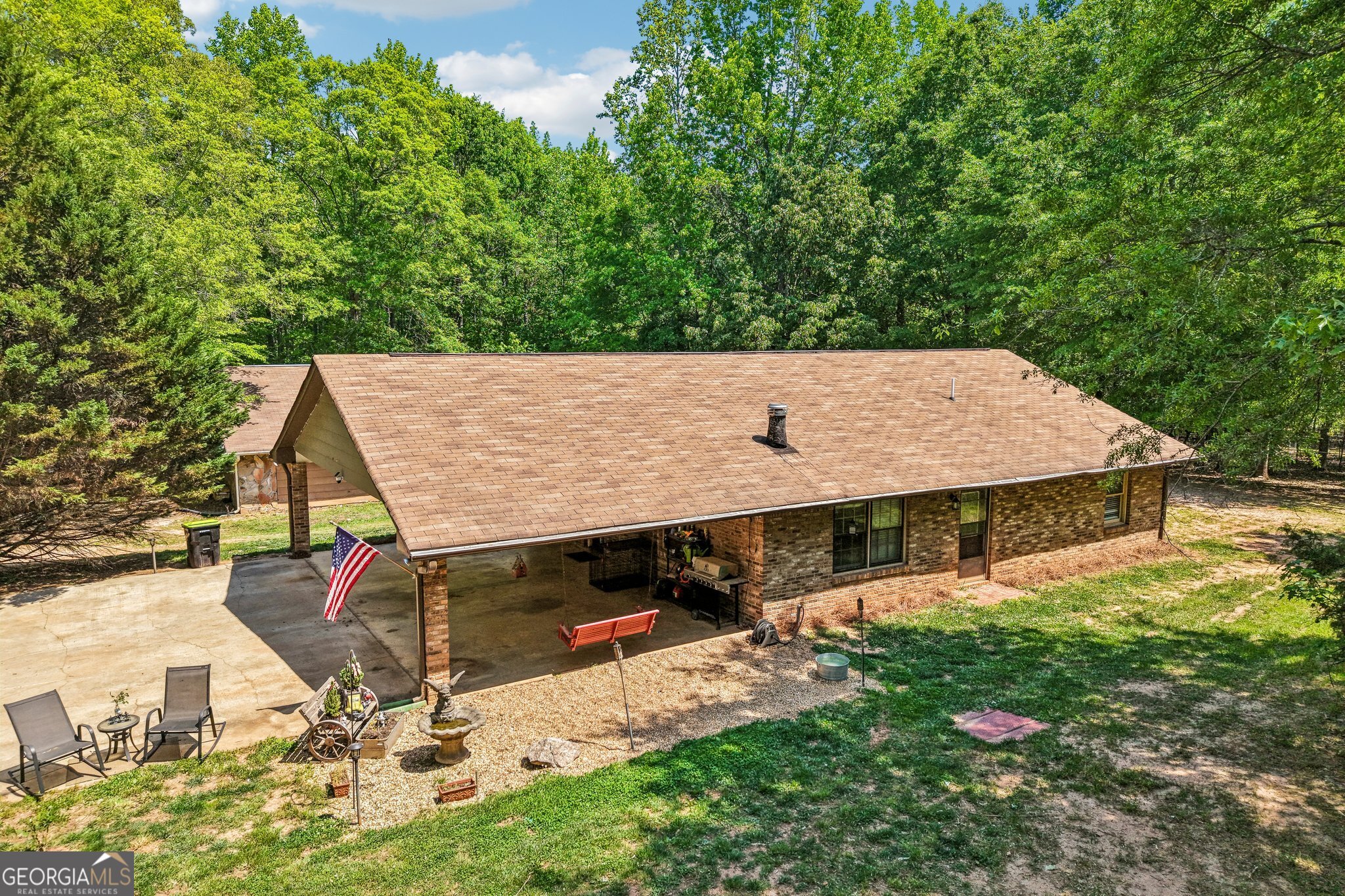 241 Busbin Road Fayetteville, GA 30215 - Photo 5 of 45 an aerial view of a house with a yard