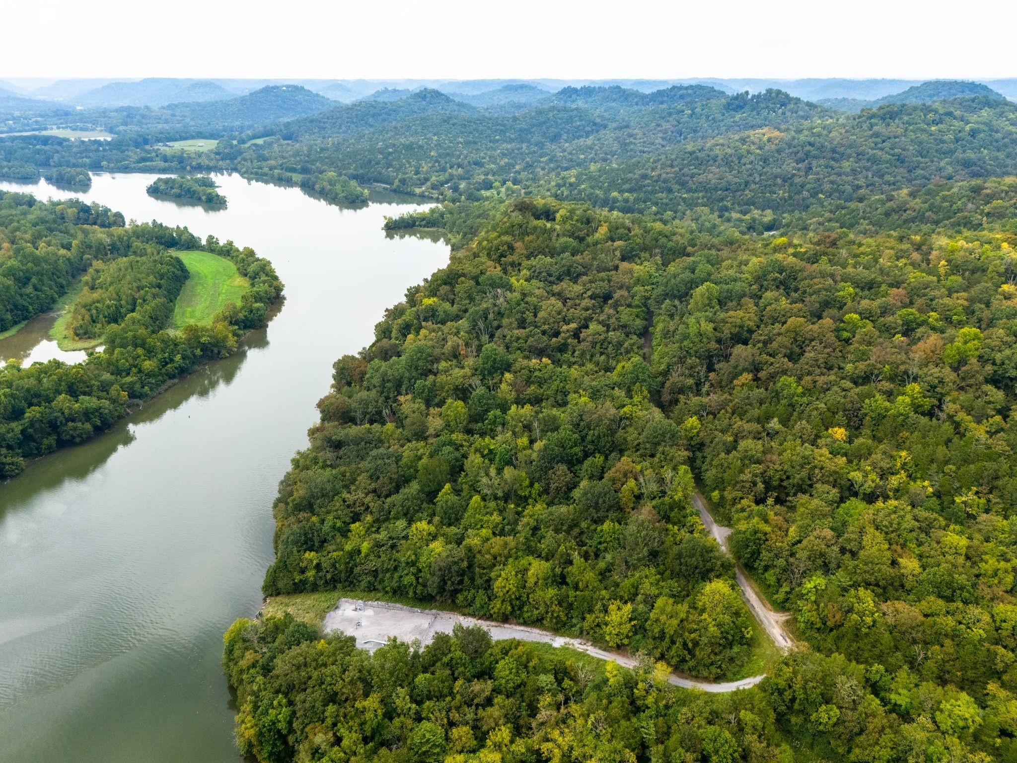 0 Big Branch Road Granville, TN 38564 - Photo 5 of 15 a view of a lake with a mountain in the back