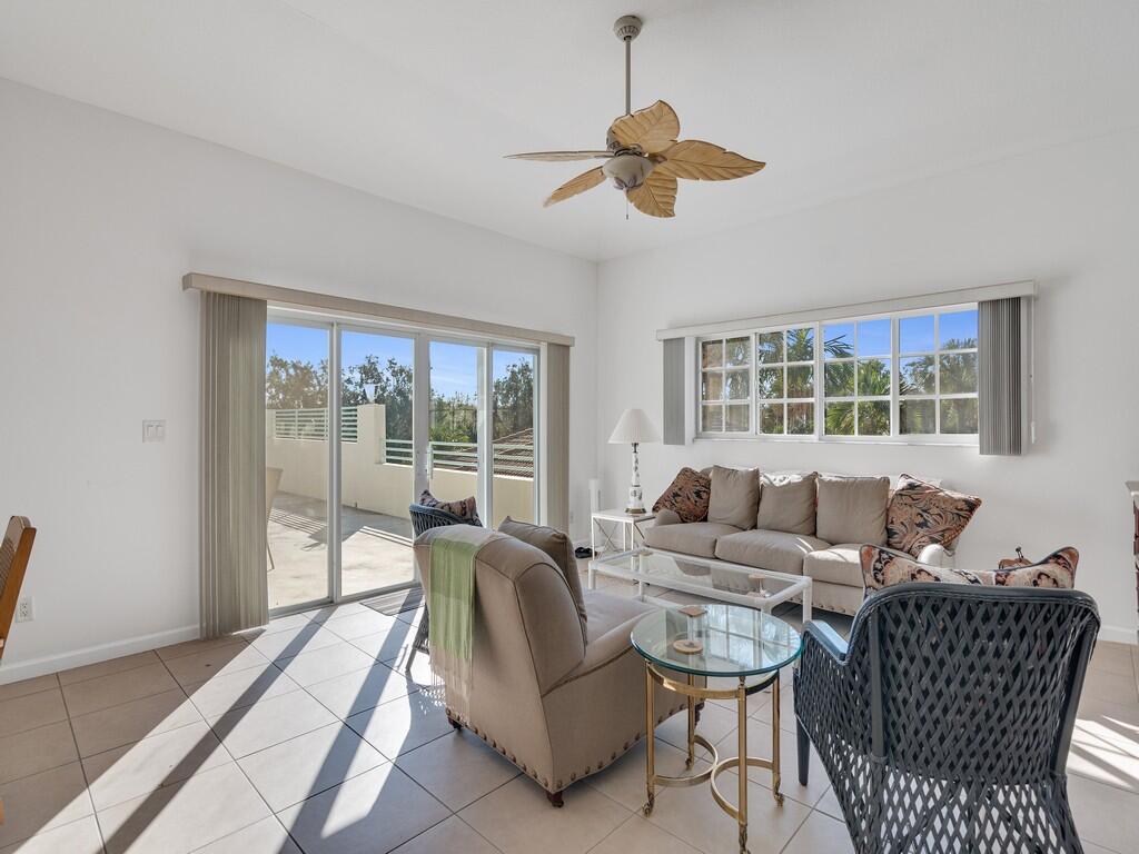 520 7th Square Southwest, Unit 201 Vero Beach, FL 32962 - Photo 3 of 46 a living room with furniture and a window