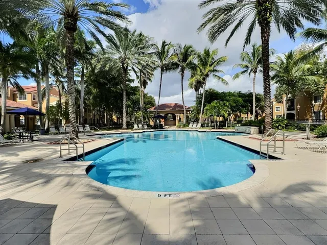 a view of outdoor space yard and swimming pool