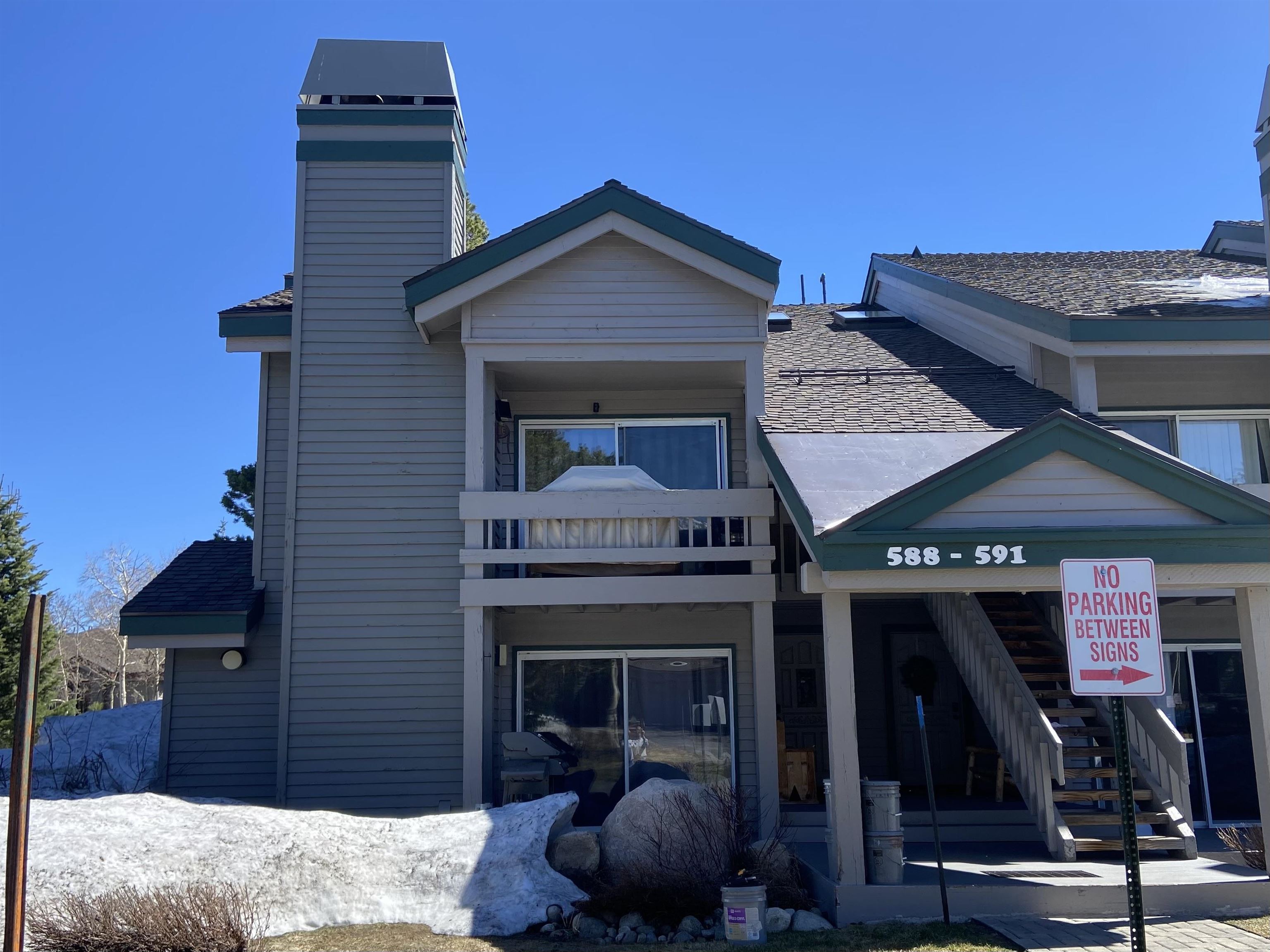 591 Golden Creek Road, Unit 591 Mammoth Lakes, CA 93546 - Photo 1 of 19 a front view of a house with parking space