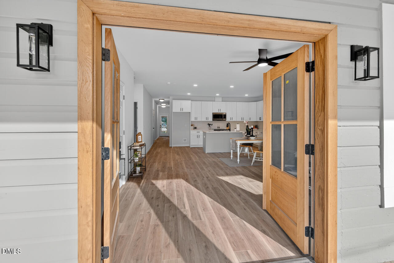 606 North Maple Street Durham, NC 27703 - Photo 10 of 51 a view of a kitchen from the hallway