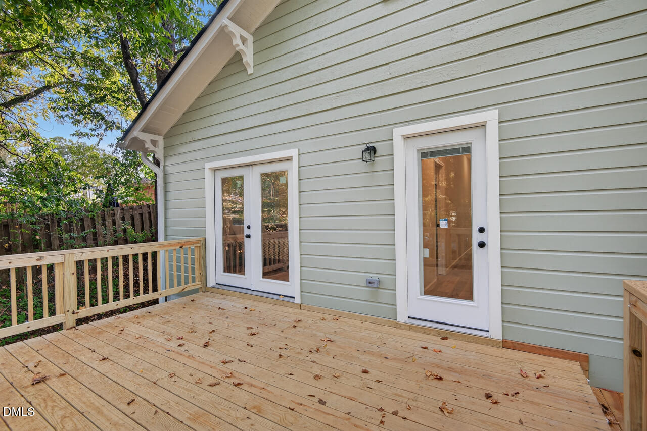 606 North Maple Street Durham, NC 27703 - Photo 39 of 51 a view of a house with wooden deck