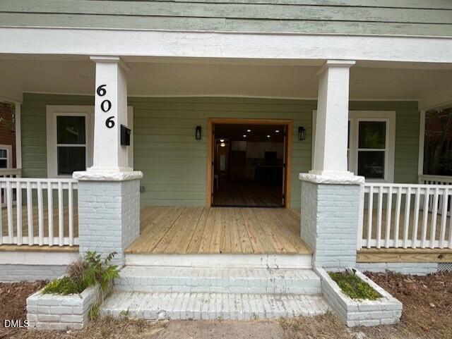 606 North Maple Street Durham, NC 27703 - Photo 3 of 51 a front view of a house with a porch