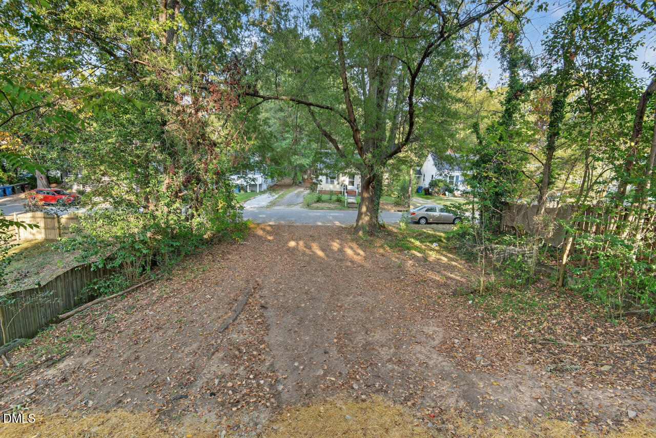 606 North Maple Street Durham, NC 27703 - Photo 43 of 51 a view of a yard with large trees
