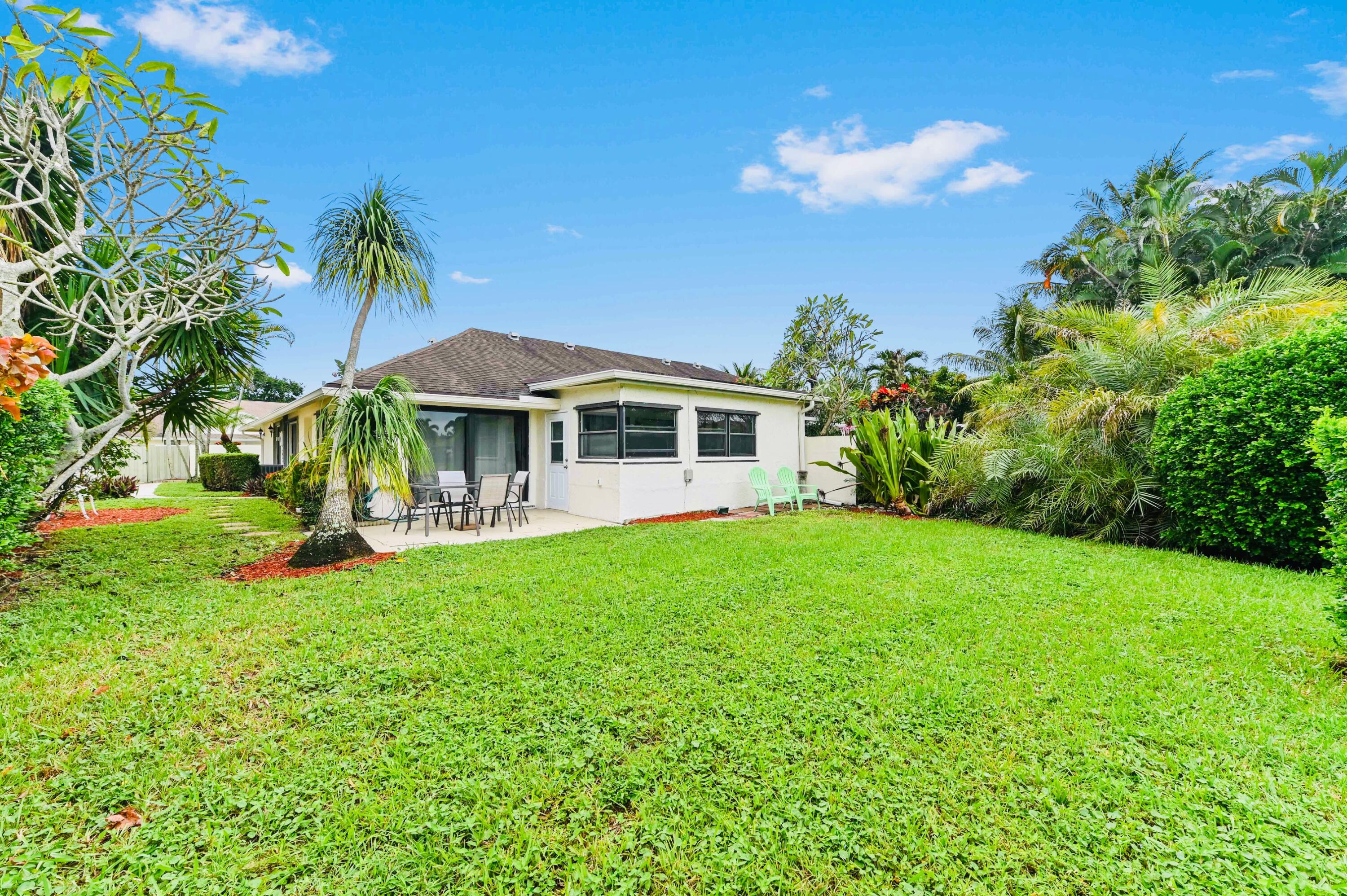 2749 Southwest 5th Street Delray Beach, FL 33445 - Photo 11 of 55 a view of a house with a backyard