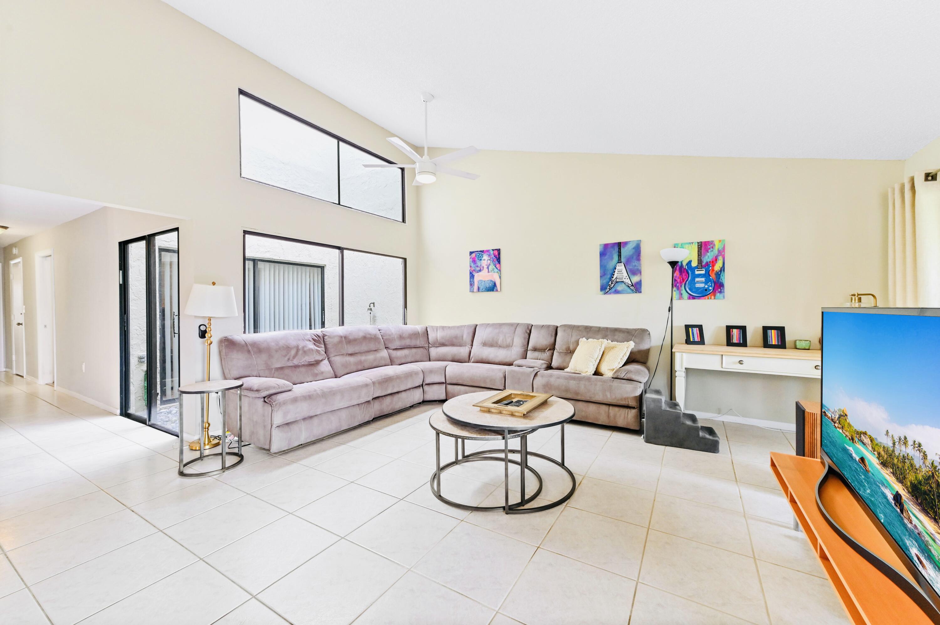 2749 Southwest 5th Street Delray Beach, FL 33445 - Photo 17 of 55 a living room with furniture and a dining table