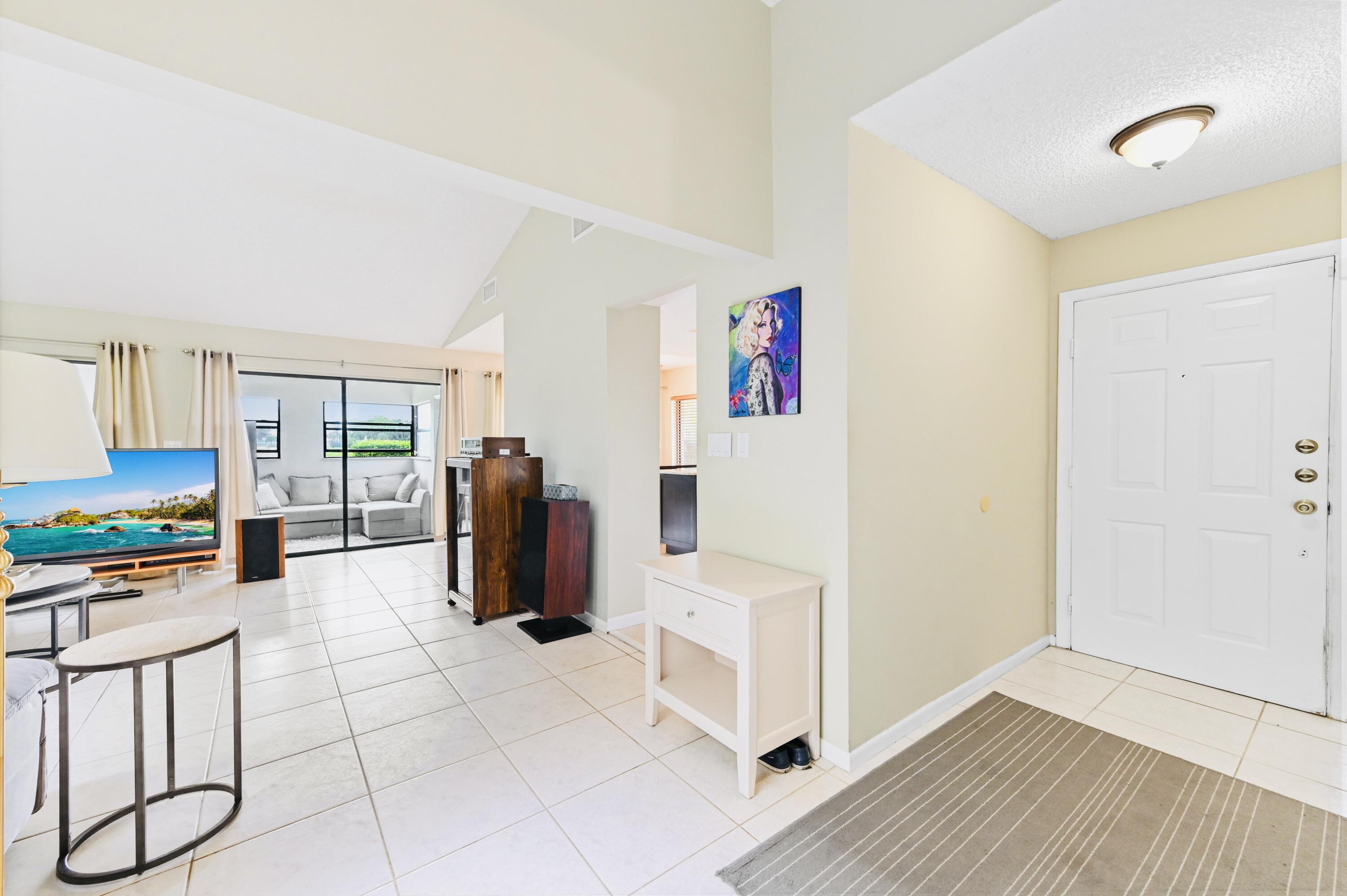 2749 Southwest 5th Street Delray Beach, FL 33445 - Photo 20 of 55 a view of kitchen with furniture and wooden floor