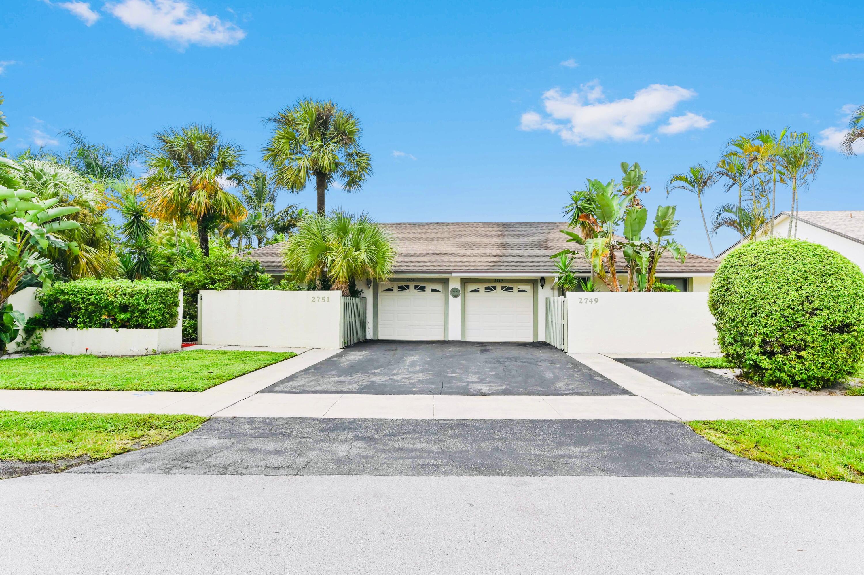 2749 Southwest 5th Street Delray Beach, FL 33445 - Photo 2 of 55 a view of a backyard