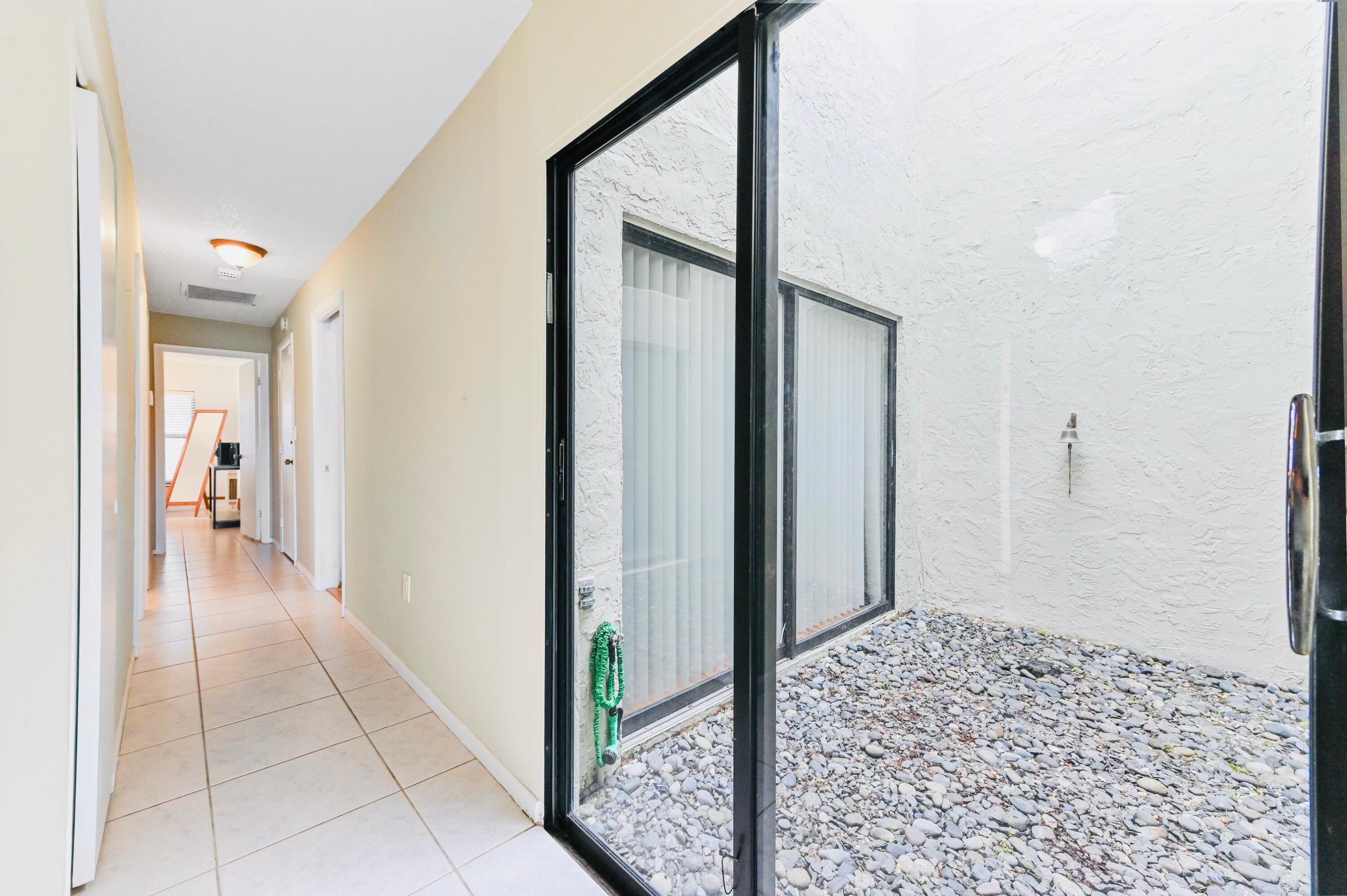 2749 Southwest 5th Street Delray Beach, FL 33445 - Photo 28 of 55 a view of a hallway
