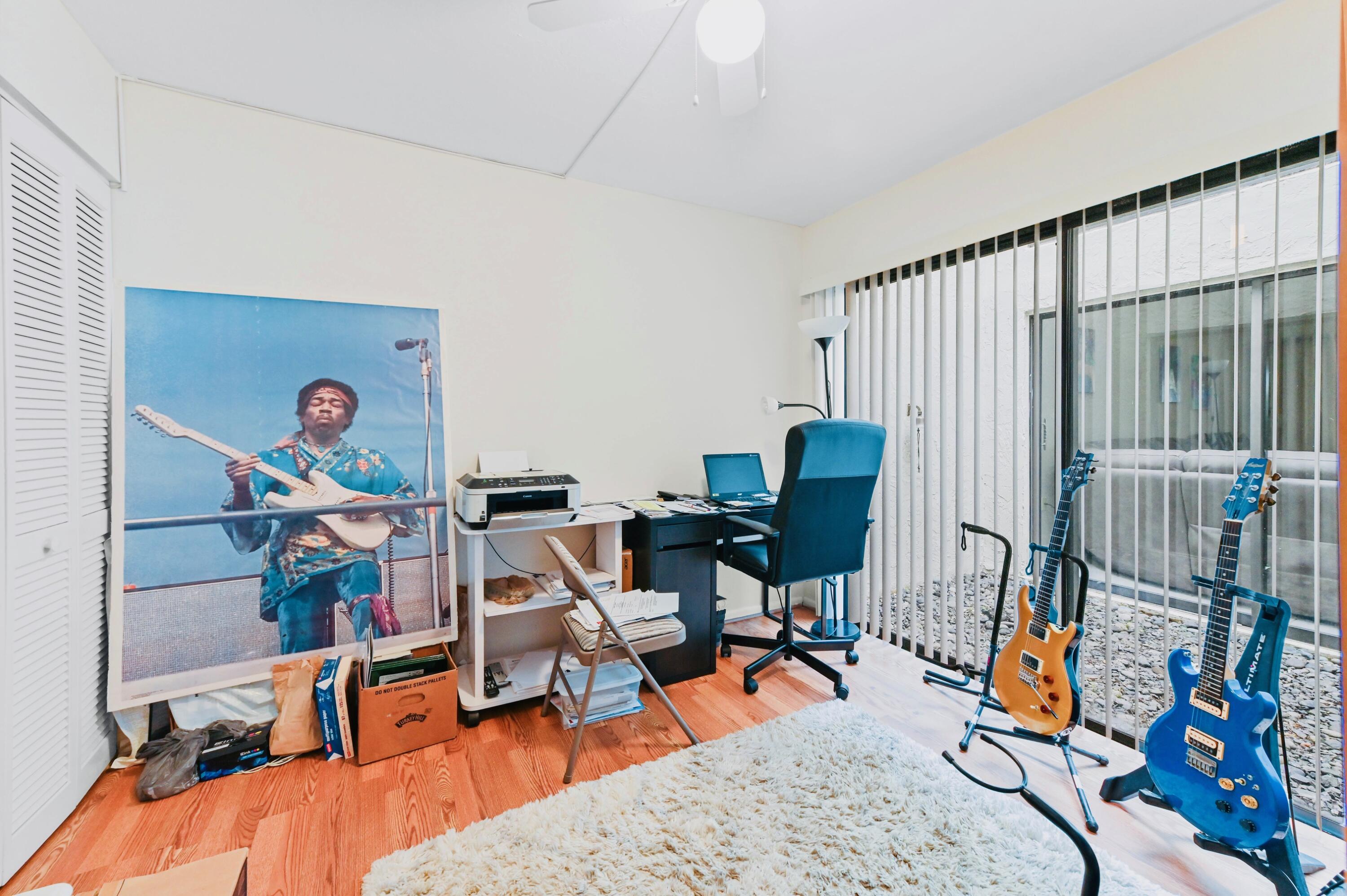 2749 Southwest 5th Street Delray Beach, FL 33445 - Photo 33 of 55 a view of a workspace with furniture and living room