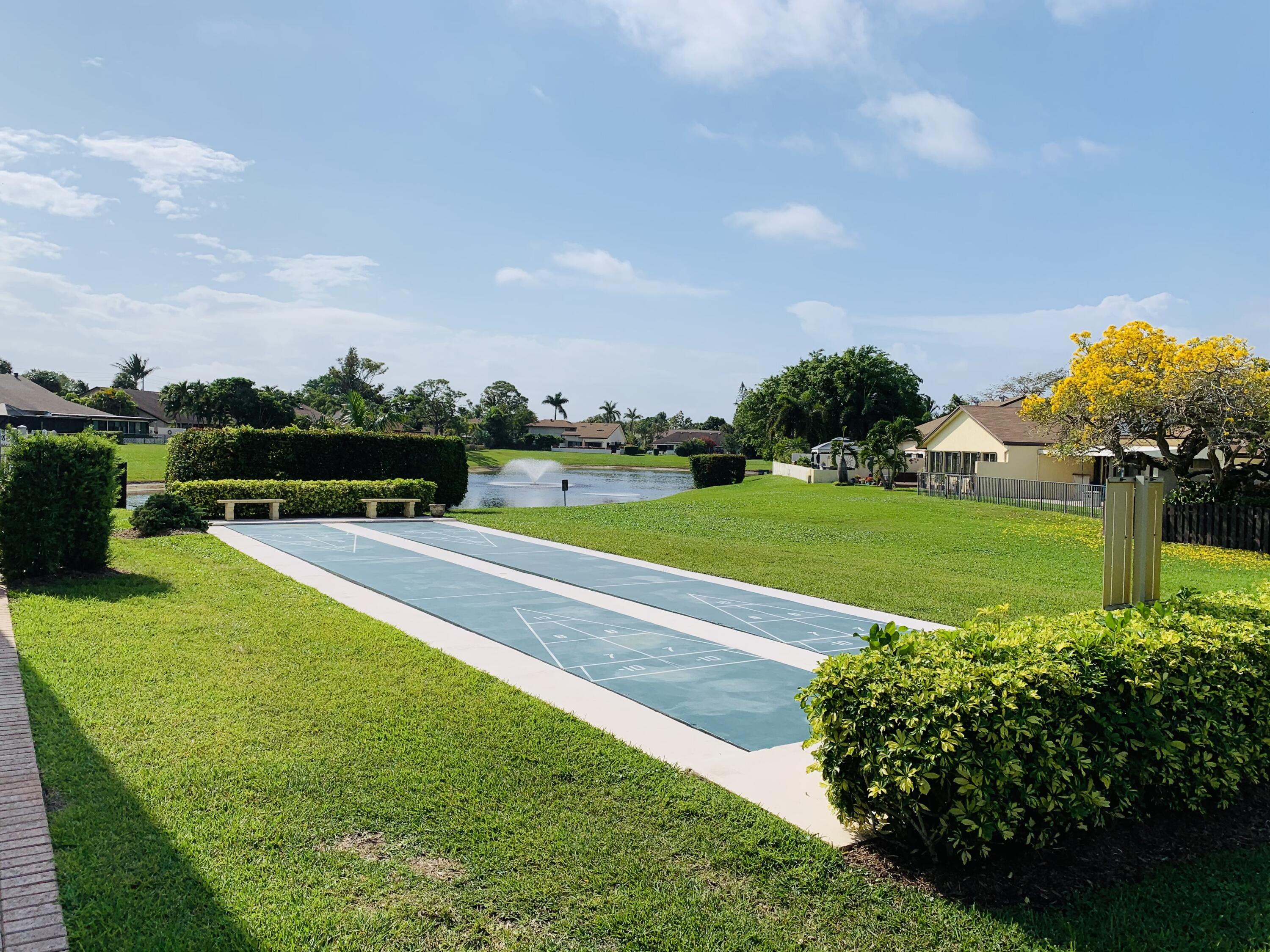 2749 Southwest 5th Street Delray Beach, FL 33445 - Photo 49 of 55 a view of a house with a yard