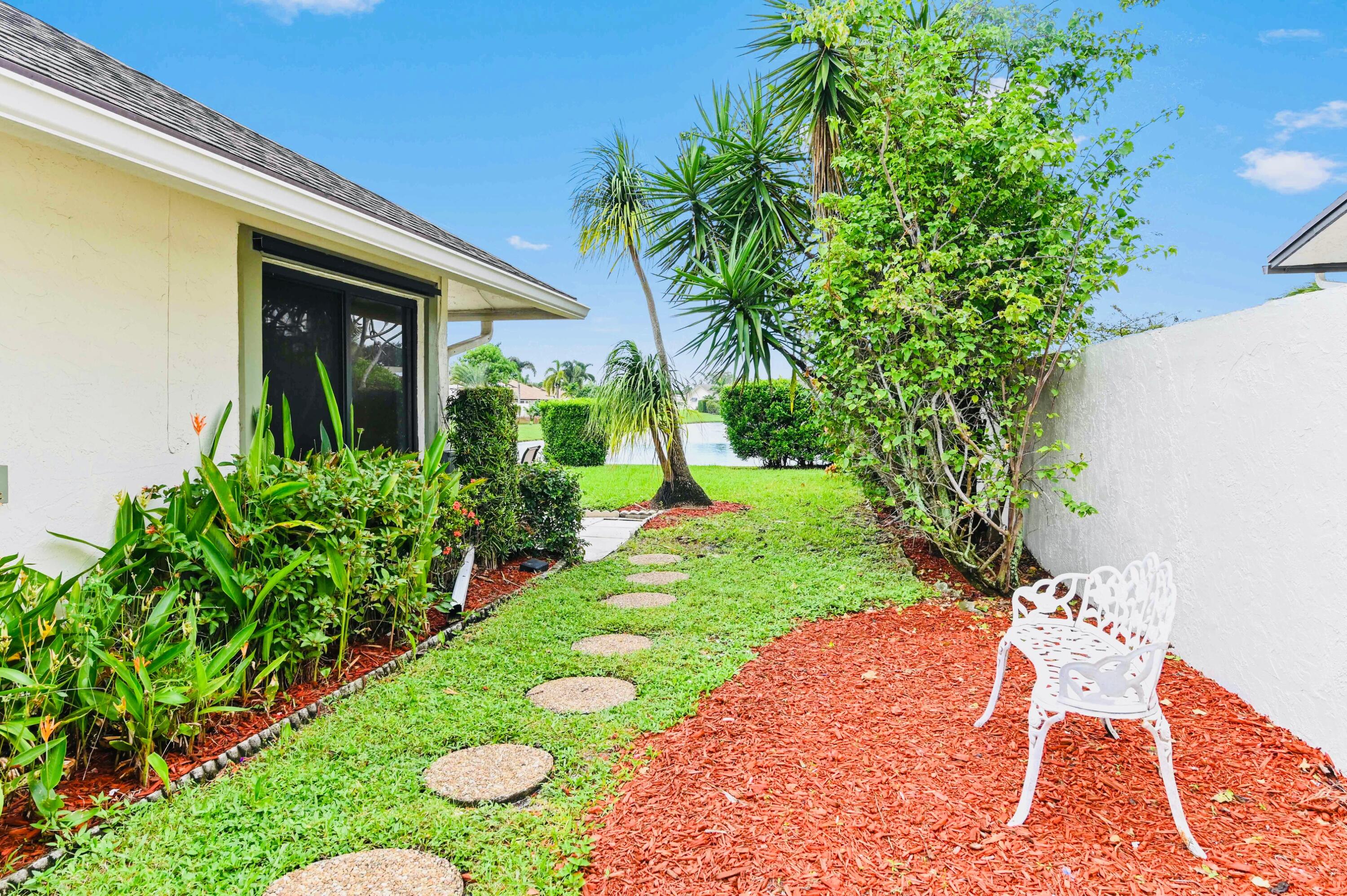 2749 Southwest 5th Street Delray Beach, FL 33445 - Photo 9 of 55 a view of yard with seating area