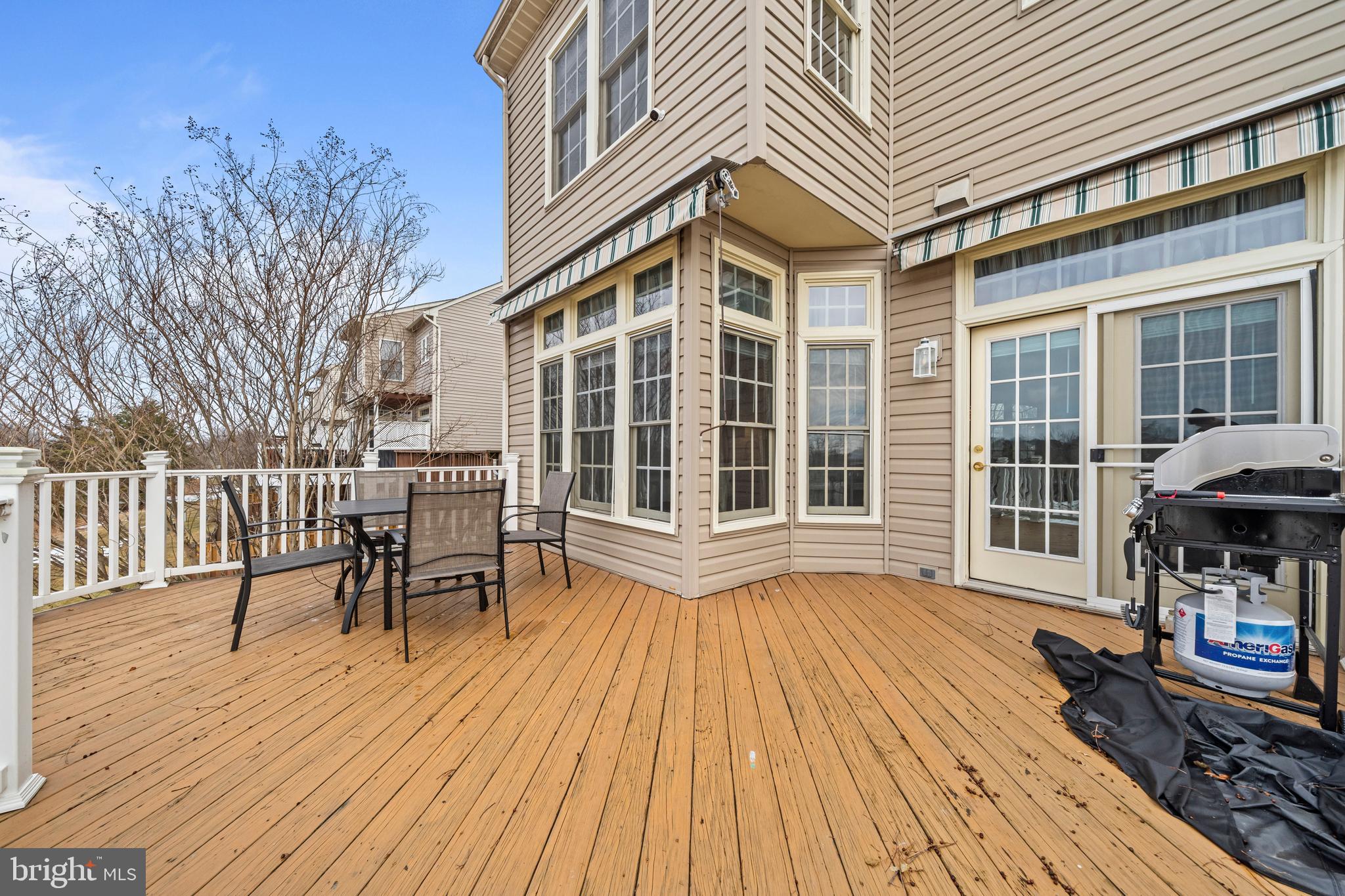 43003 Golf View Drive Chantilly, VA 20152 - Photo 18 of 54 a view of a house with a large window and wooden floor