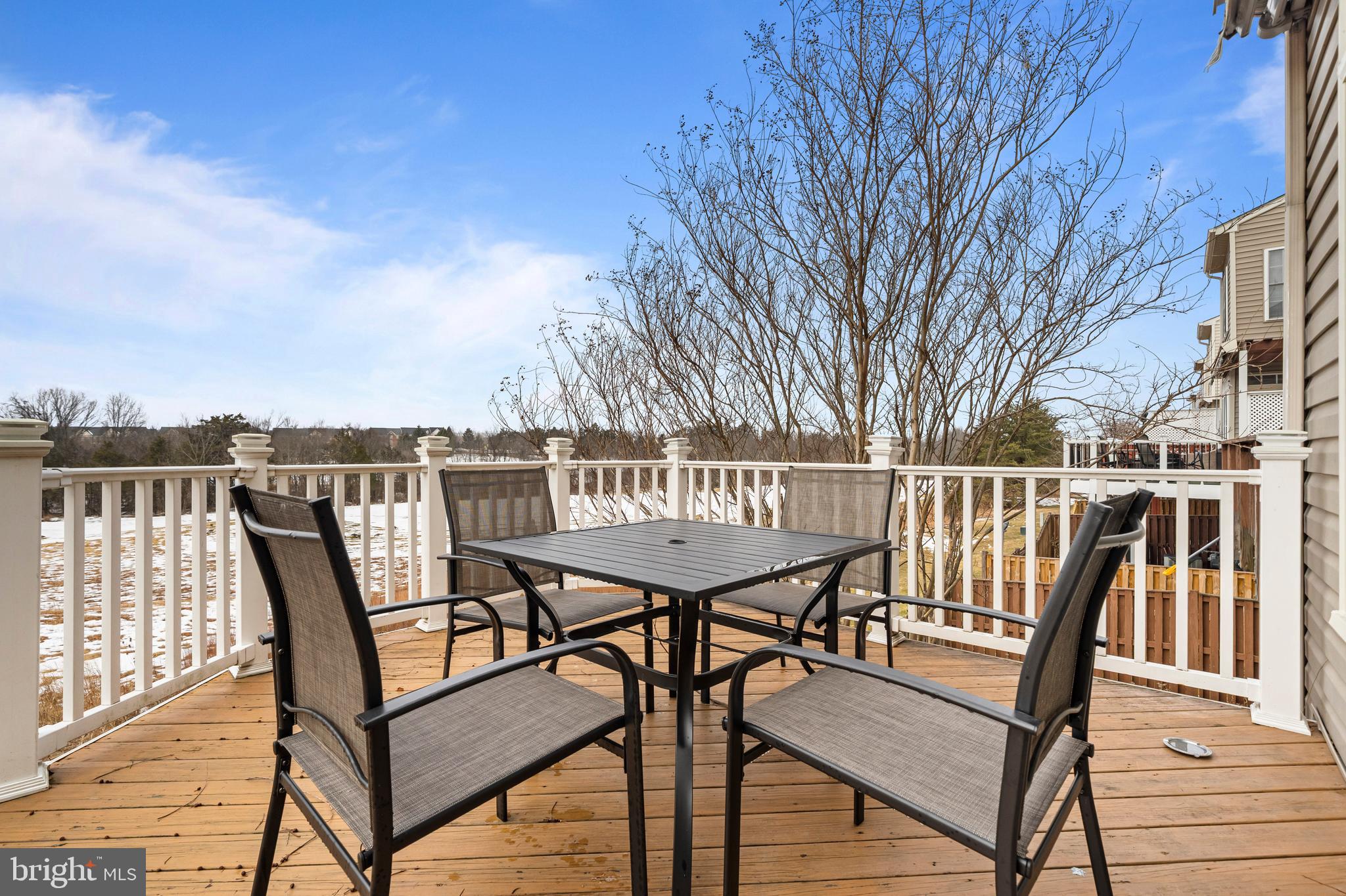 43003 Golf View Drive Chantilly, VA 20152 - Photo 19 of 54 a view of a chairs on wooden deck