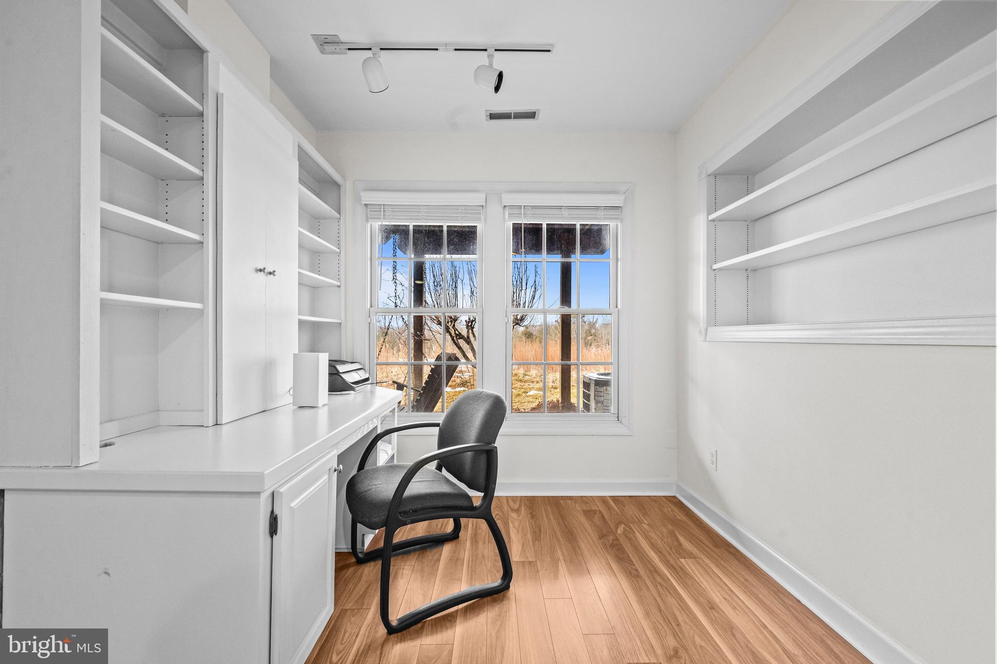 43003 Golf View Drive Chantilly, VA 20152 - Photo 37 of 54 a view of a room with wooden floor and windows