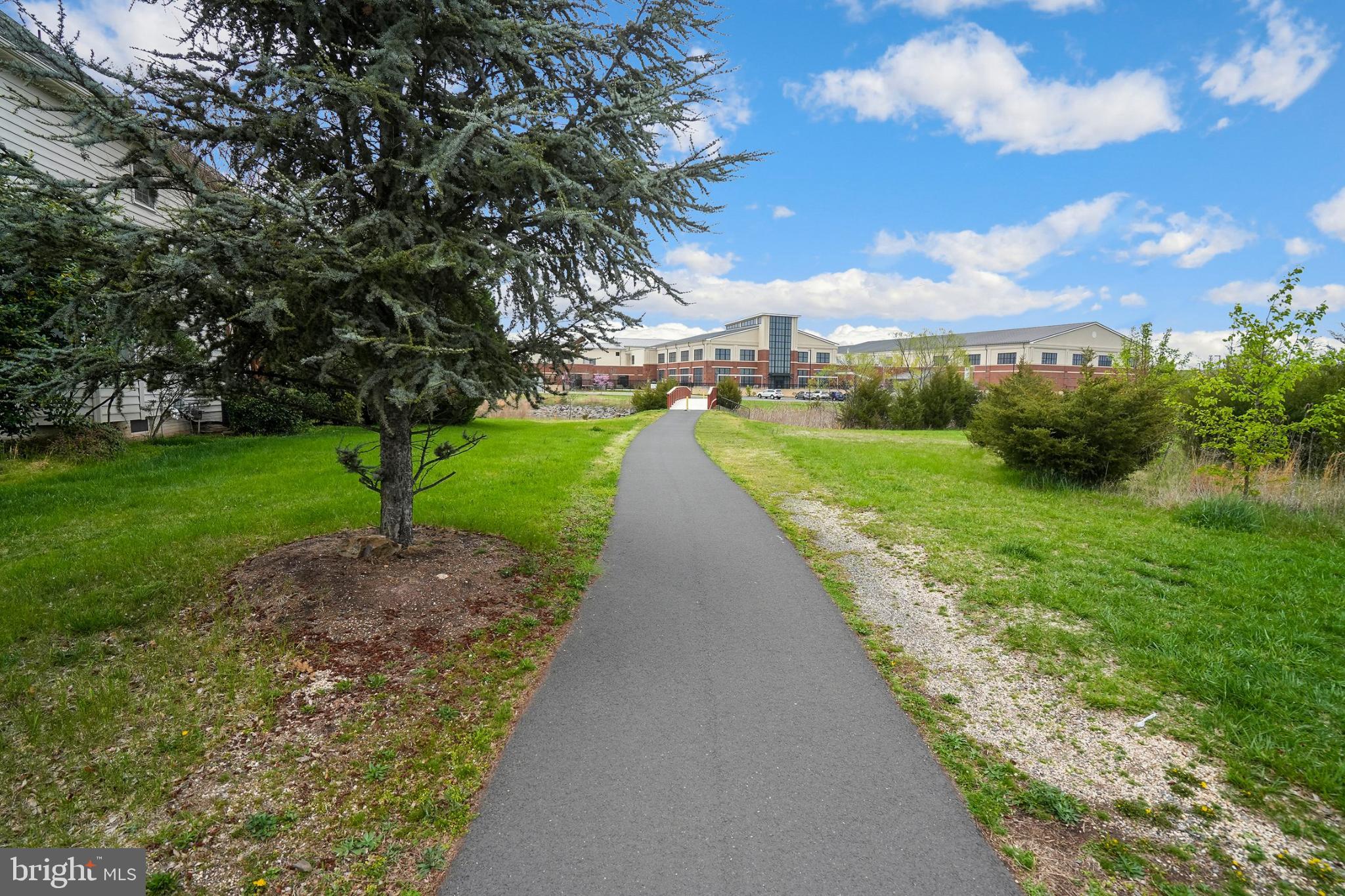 43003 Golf View Drive Chantilly, VA 20152 - Photo 42 of 54 Scenic pathway through lush greenery.