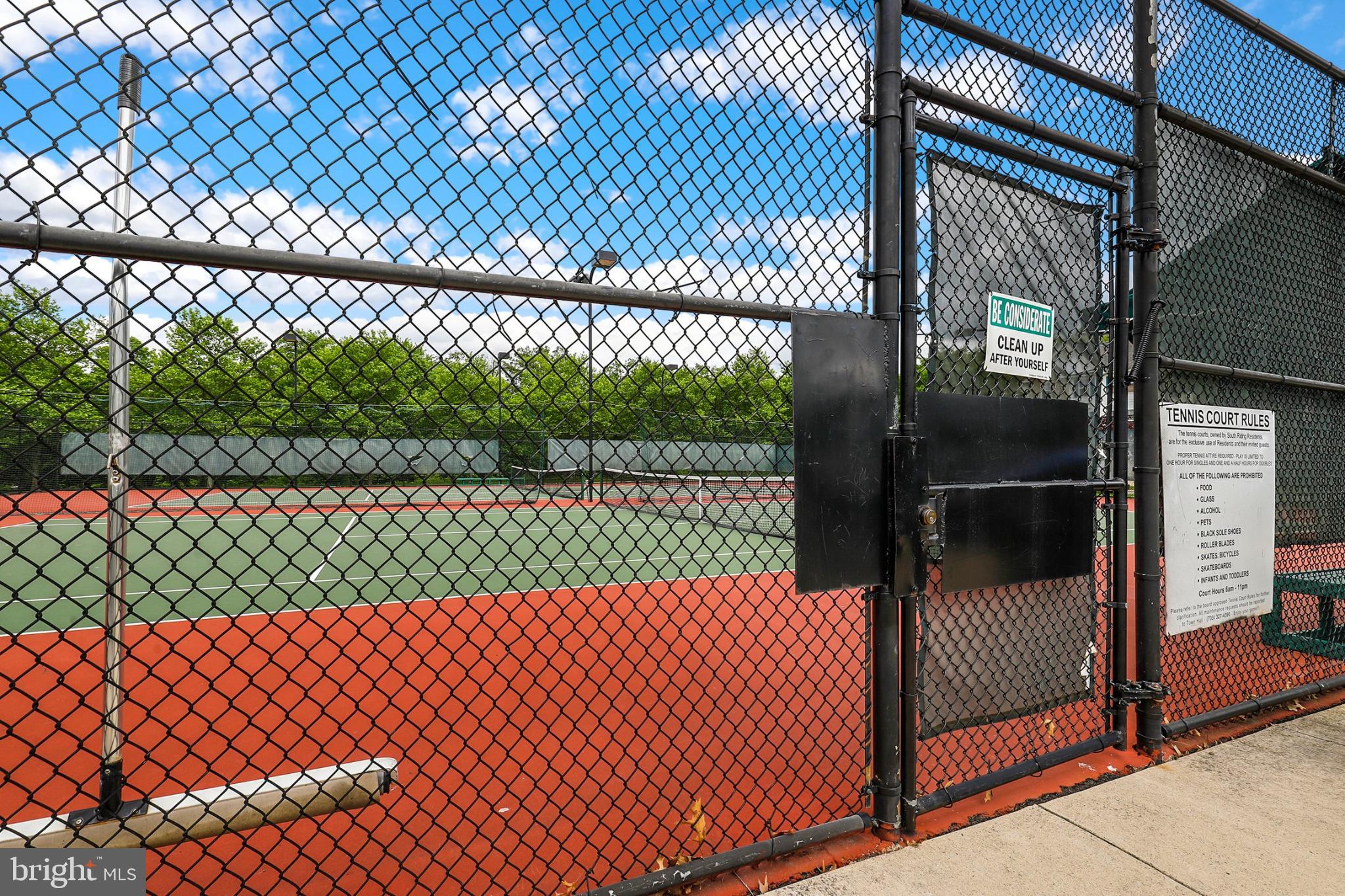 43003 Golf View Drive Chantilly, VA 20152 - Photo 43 of 54 Tennis courts ready for action under blue skies.