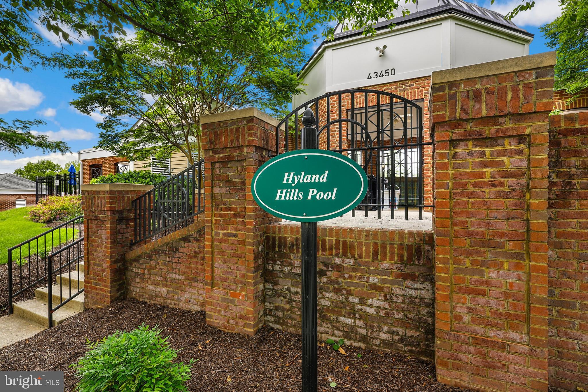 43003 Golf View Drive Chantilly, VA 20152 - Photo 44 of 54 a sign on a brick wall