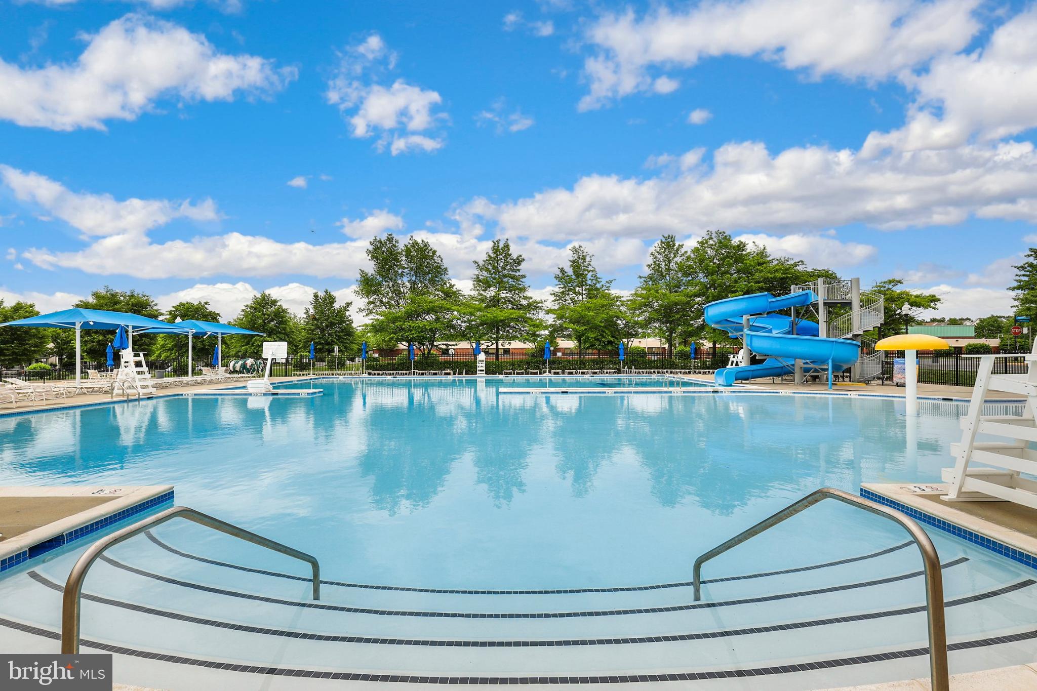 43003 Golf View Drive Chantilly, VA 20152 - Photo 46 of 54 a view of swimming pool with outdoor seating and lake view