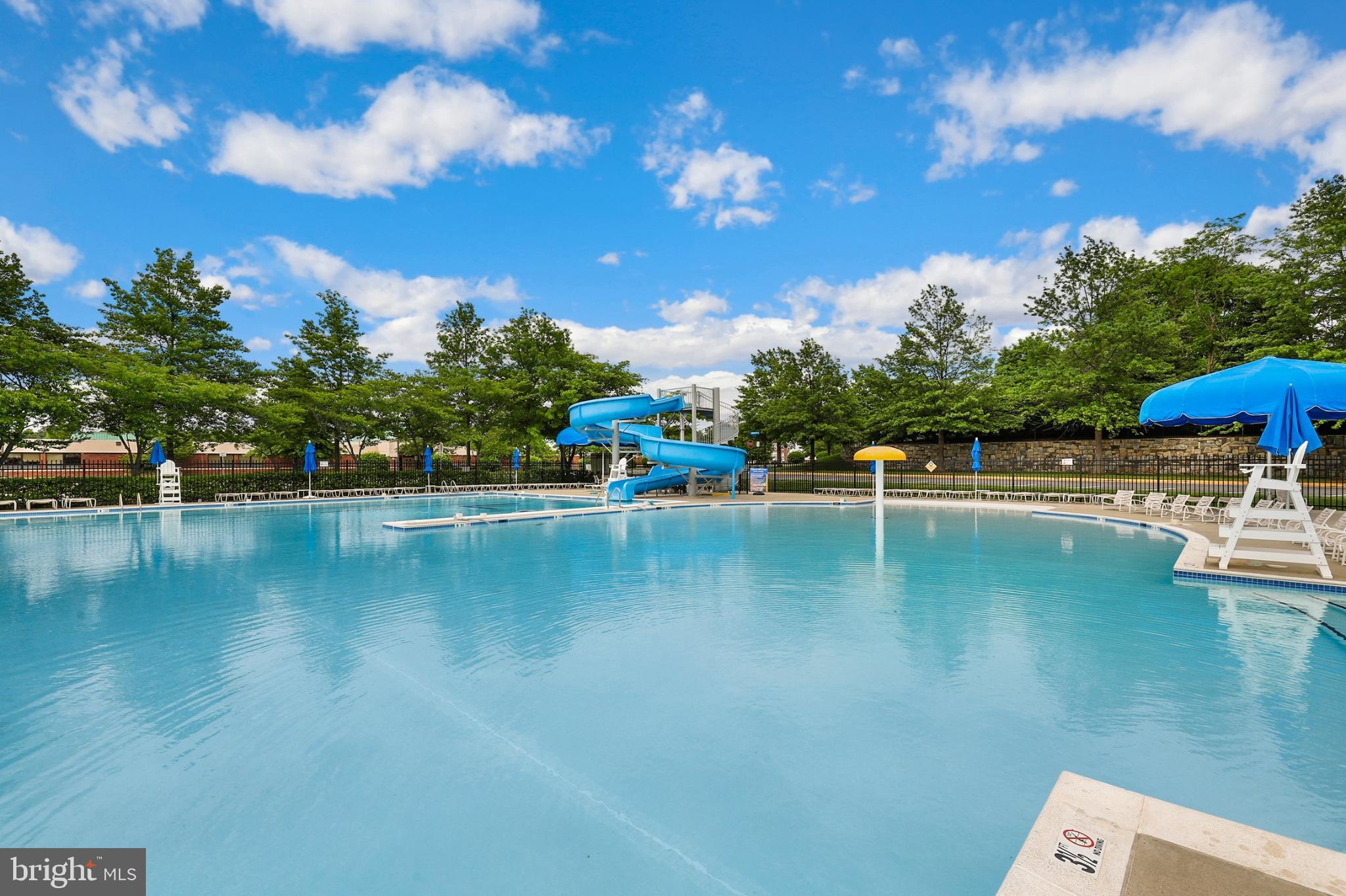 43003 Golf View Drive Chantilly, VA 20152 - Photo 47 of 54 a view of swimming pool with outdoor seating