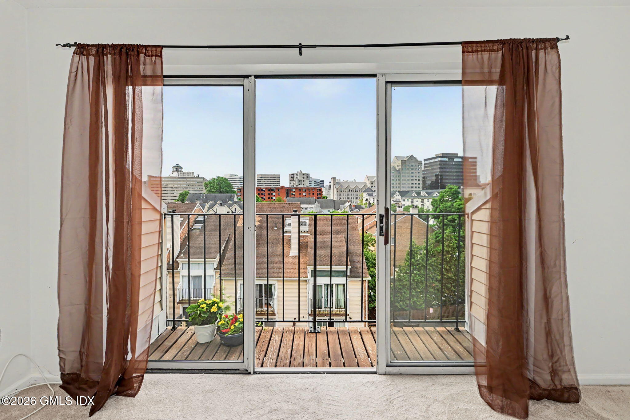 21 Highland Road, Unit 21 Stamford, CT 06901 - Photo 11 of 19 Primary Bedroom Balcony