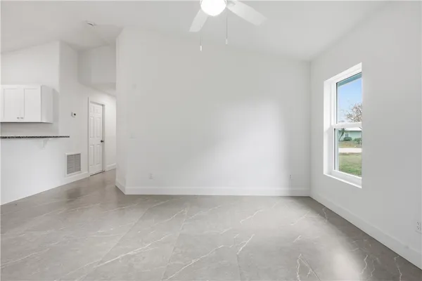 an empty room with windows