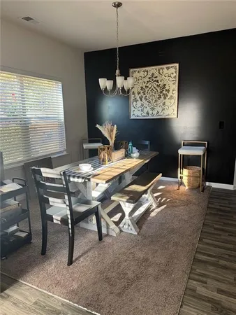 a view of a workspace with furniture