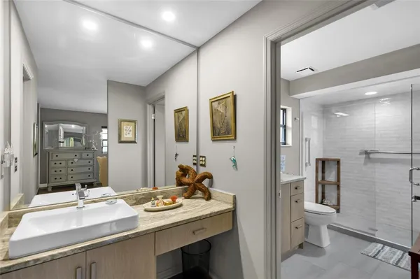 a view of house with swimming pool yard and outdoor seating