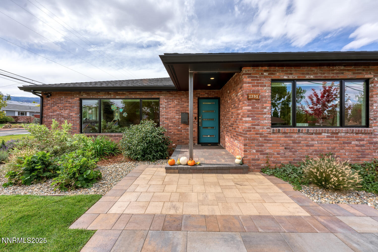 2395 Watt Street Reno, NV 89509 - Photo 40 of 50 a front view of a house with garden