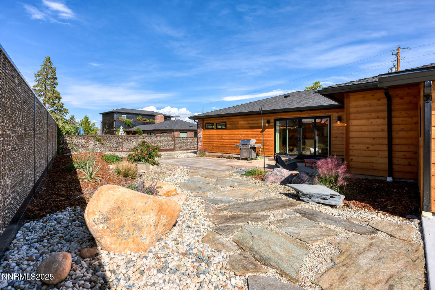 2395 Watt Street Reno, NV 89509 - Photo 48 of 50 a view of a backyard patio and fire pit