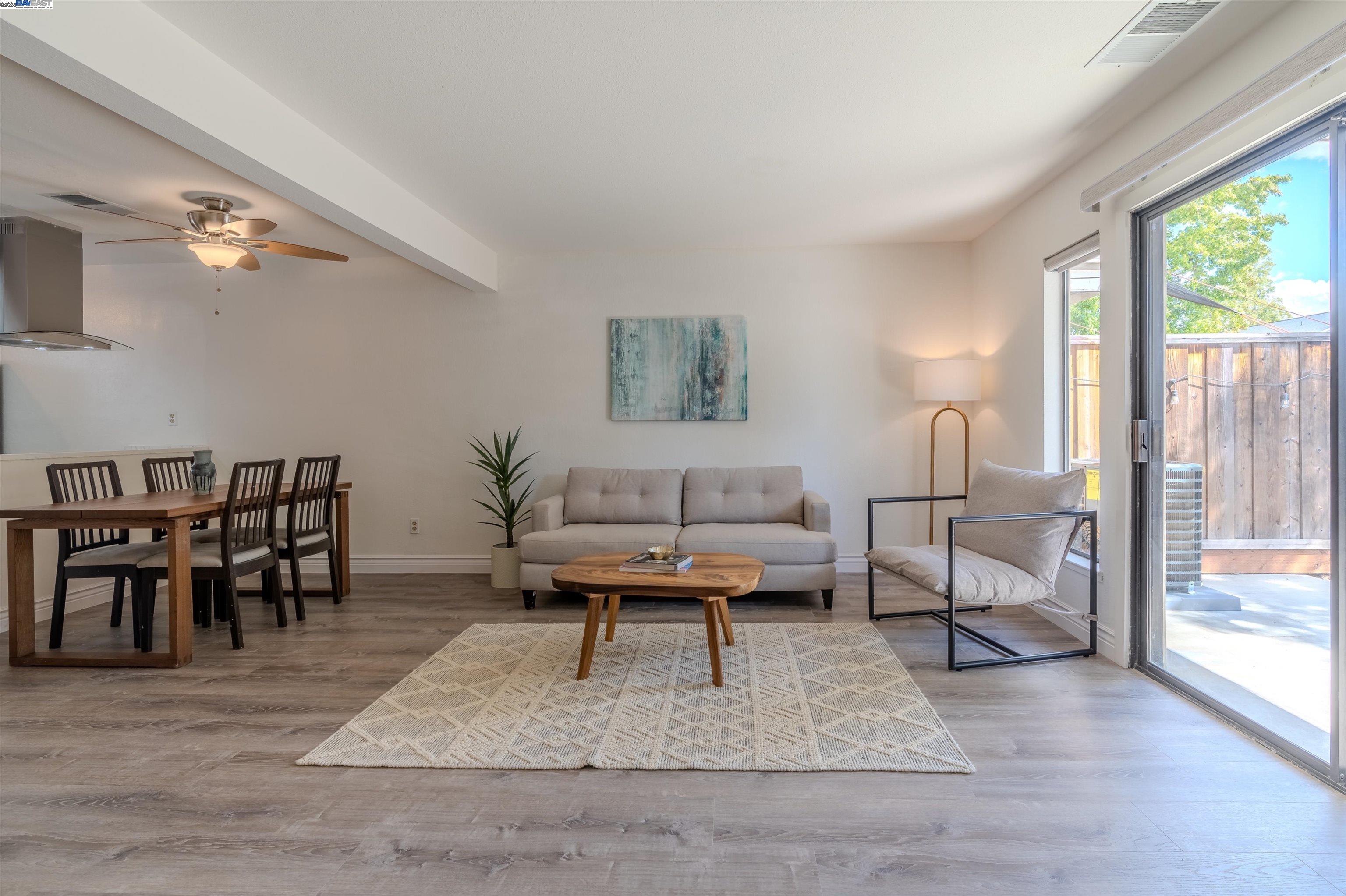 1785 Paseo Laguna Seco Livermore, CA 94551 - Photo 12 of 27 a living room with furniture and a table