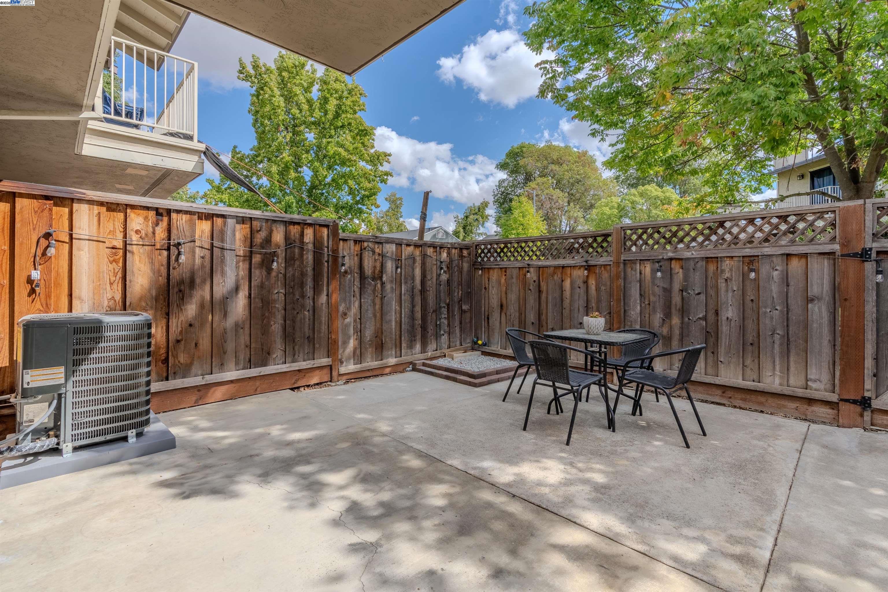 1785 Paseo Laguna Seco Livermore, CA 94551 - Photo 16 of 27 a backyard of a house with table and chairs