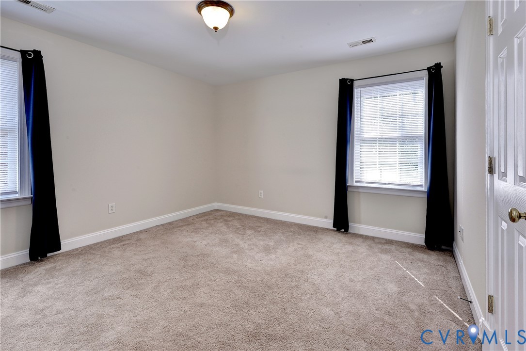 11385 Winding River Road Providence Forge, VA 23140 - Photo 33 of 43 an empty room with windows