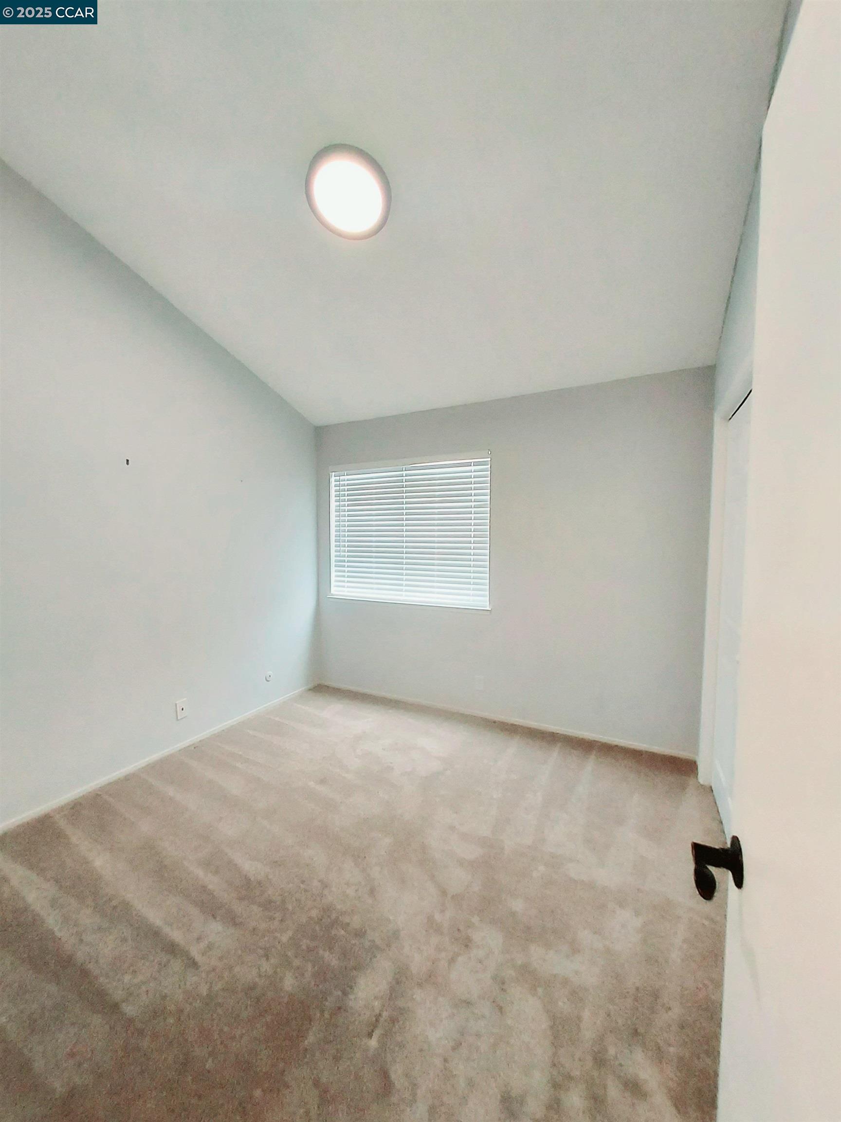 3712 Willow Pass Road, Unit 32 Concord, CA 94519 - Photo 15 of 20 a view of an empty room with a window