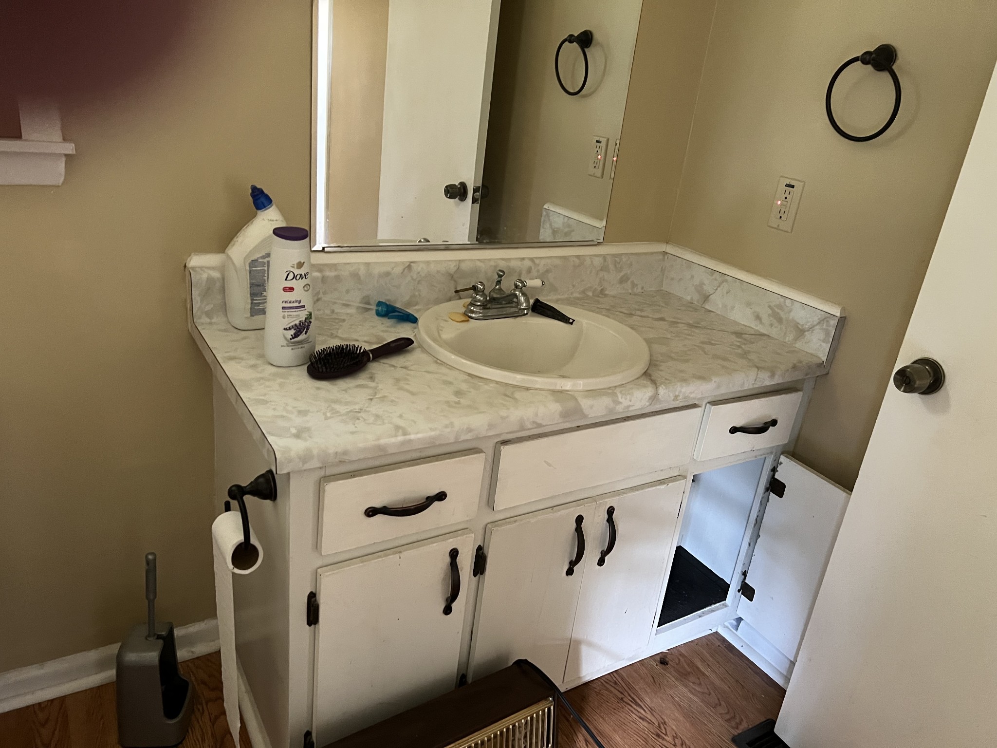 929 Industrial Access Road Pulaski, TN 38478 - Photo 18 of 28 a bathroom with a granite countertop sink and a mirror