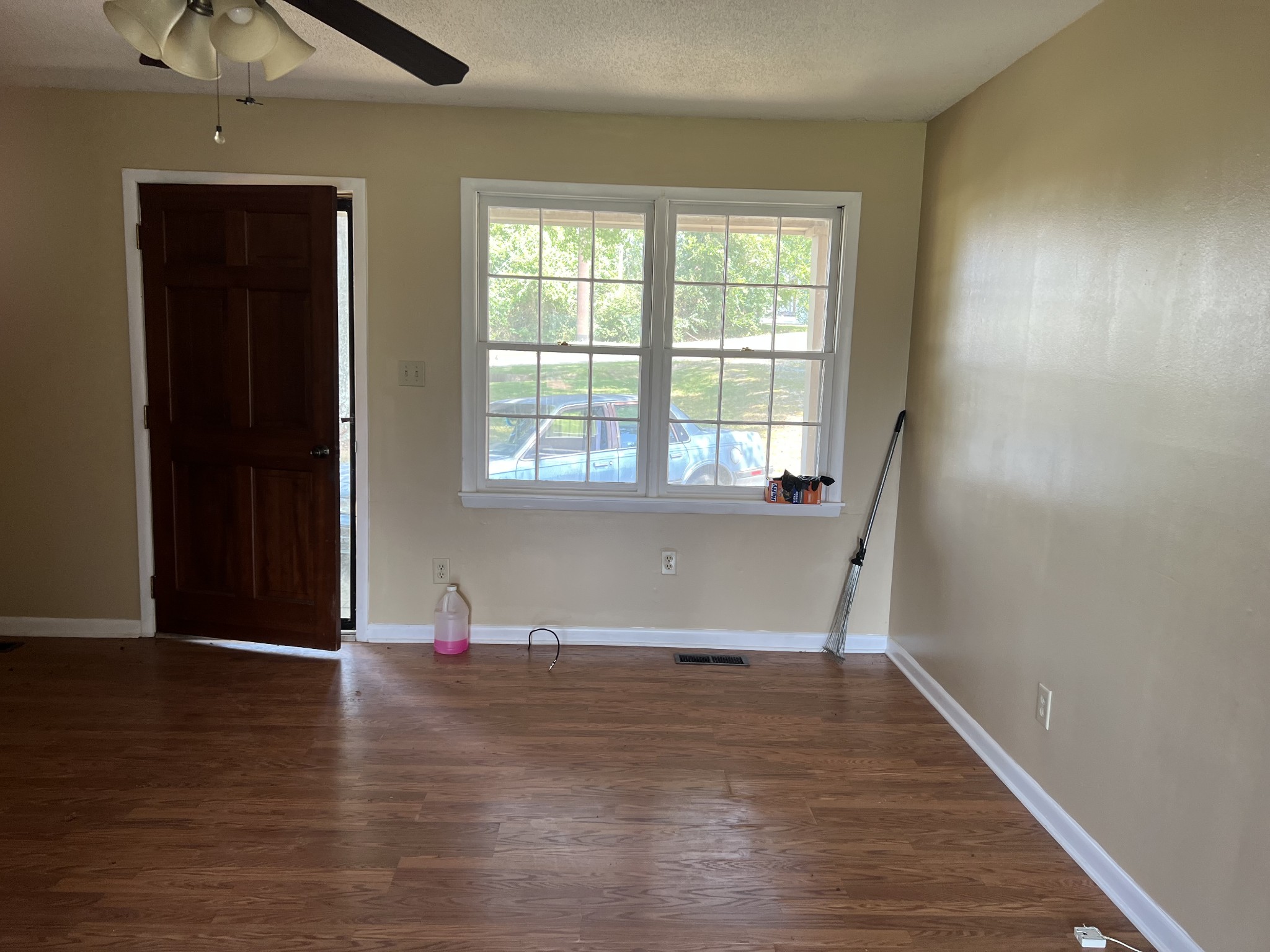 929 Industrial Access Road Pulaski, TN 38478 - Photo 4 of 28 an empty room with wooden floor and windows