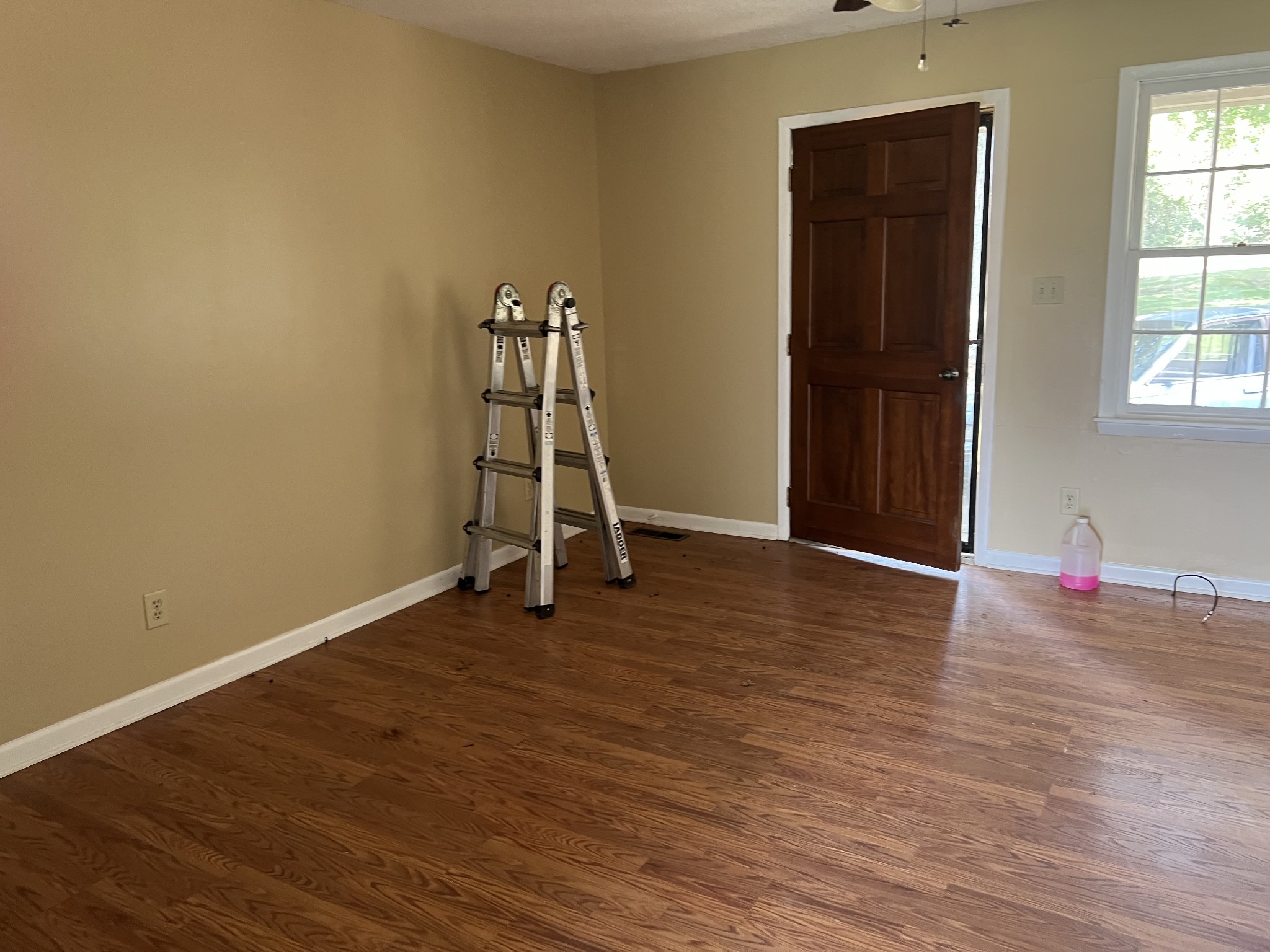929 Industrial Access Road Pulaski, TN 38478 - Photo 5 of 28 a view of a room with wooden floor and a window