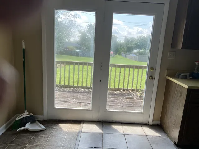 a view of front door and porch