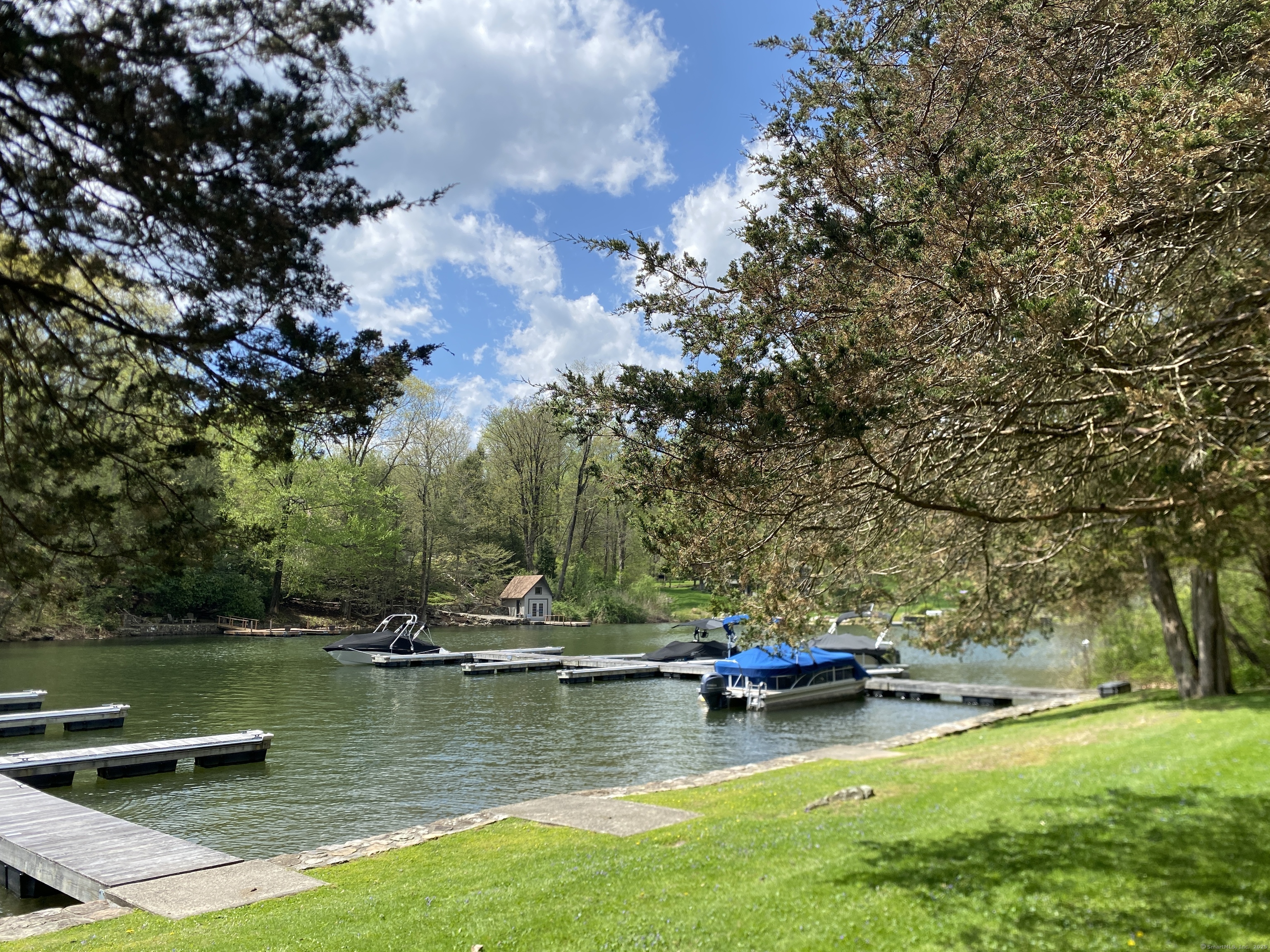 21 Holiday Point Road Sherman, CT 06784 - Photo 22 of 25 a view of a lake with houses