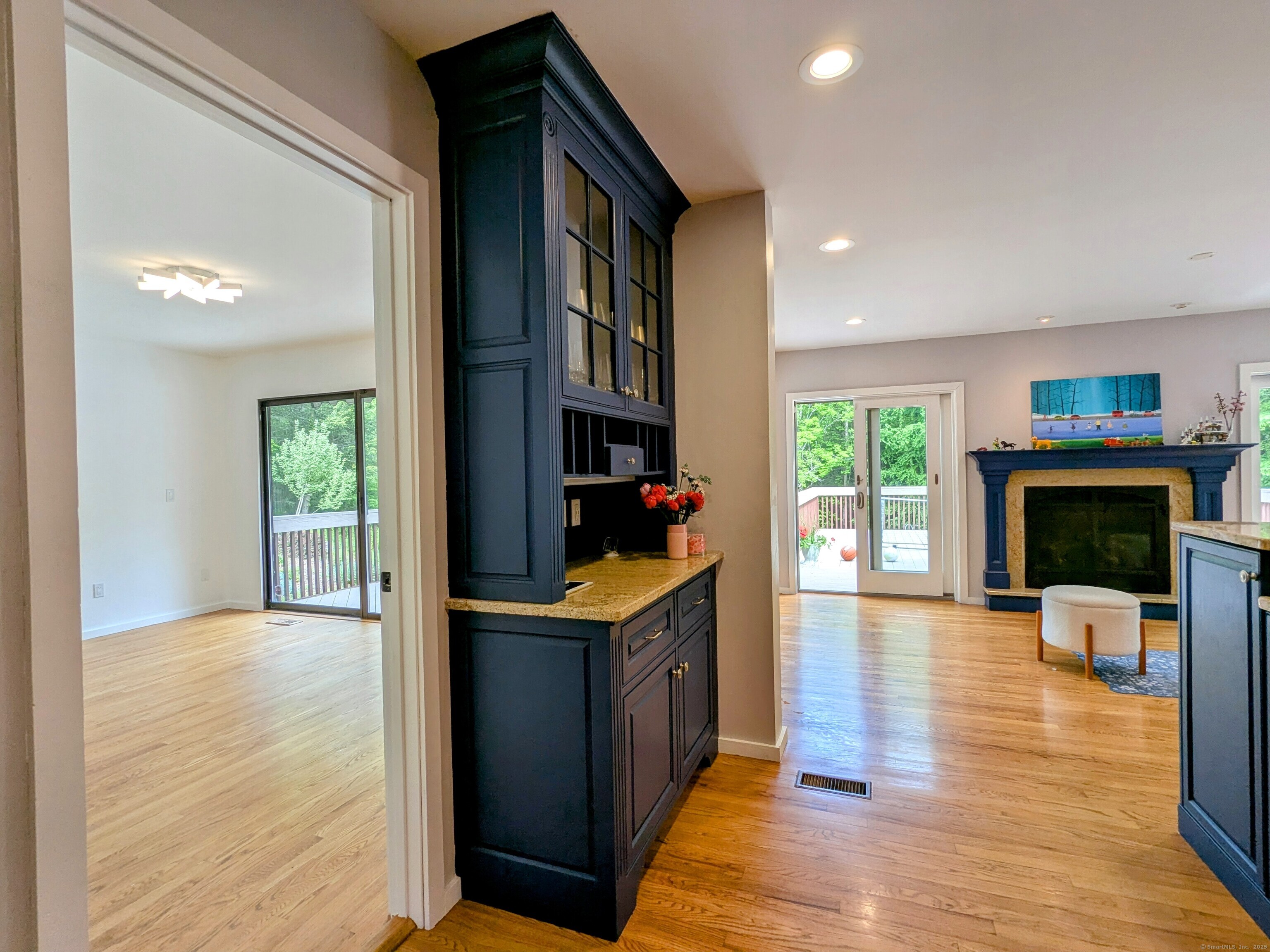 21 Holiday Point Road Sherman, CT 06784 - Photo 5 of 25 a view of a kitchen and dining room