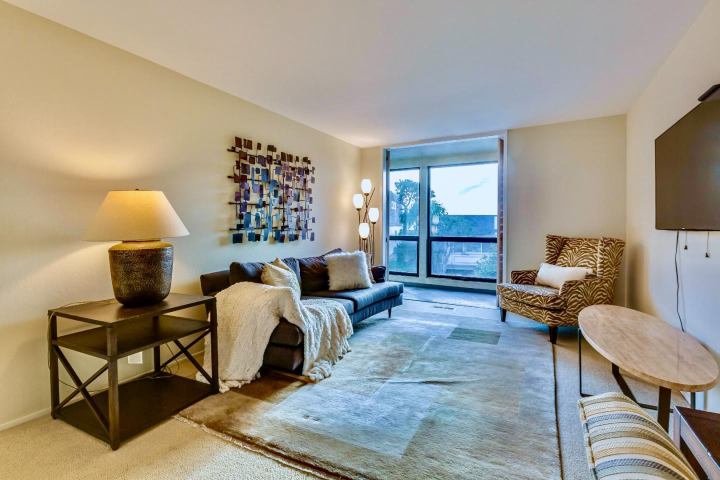 13 Ora Way San Francisco, CA 94131 - Photo 23 of 60 a living room with furniture and a flat screen tv