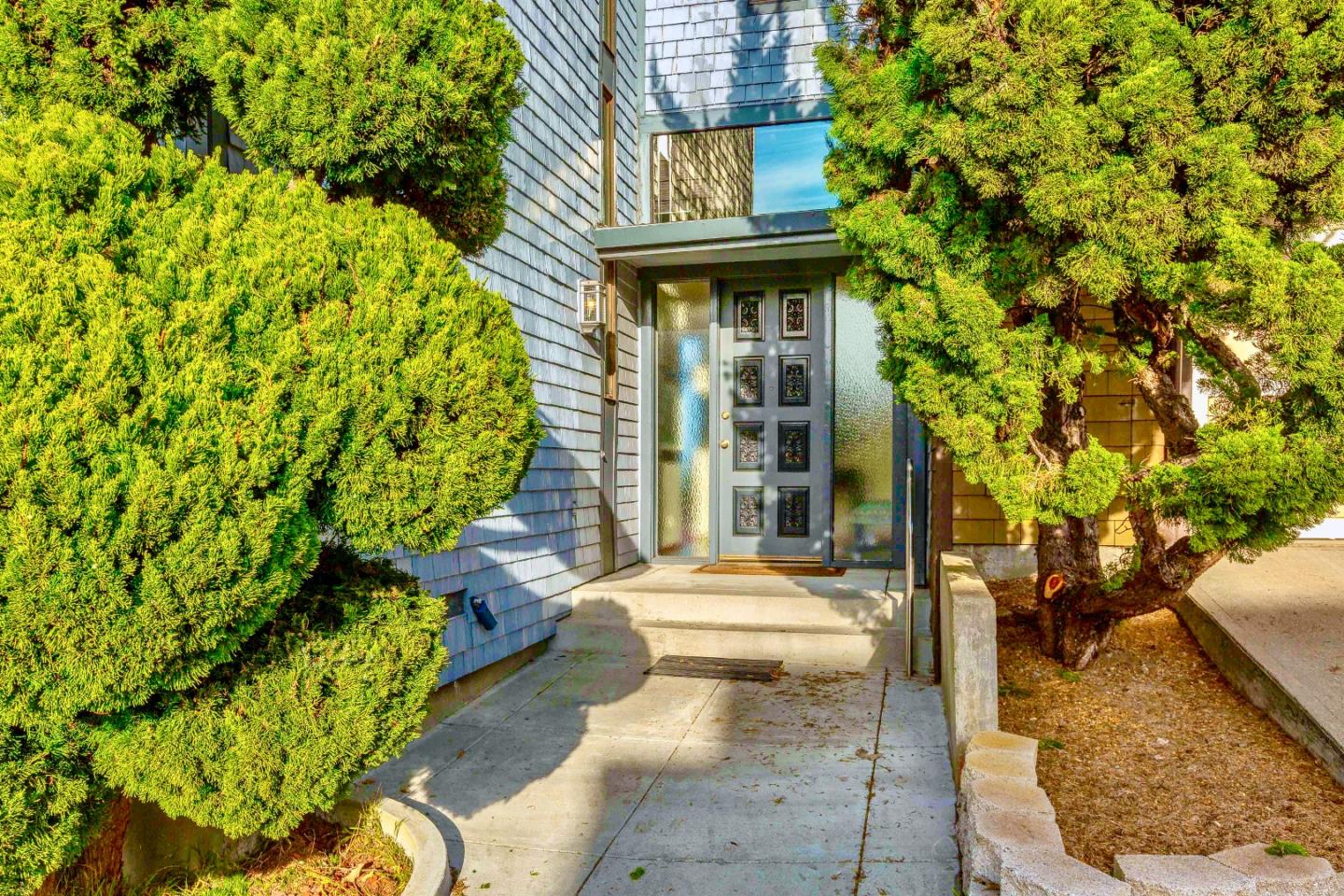 13 Ora Way San Francisco, CA 94131 - Photo 4 of 60 a view of a fountain with flower plants