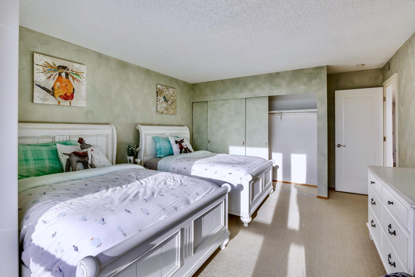 13 Ora Way San Francisco, CA 94131 - Photo 43 of 60 a bedroom with a bed and a dresser in it