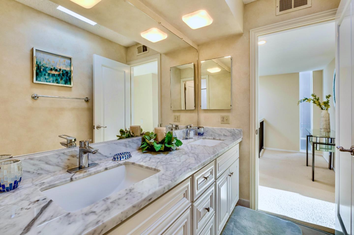 13 Ora Way San Francisco, CA 94131 - Photo 46 of 60 a bathroom with a granite countertop sink and a mirror