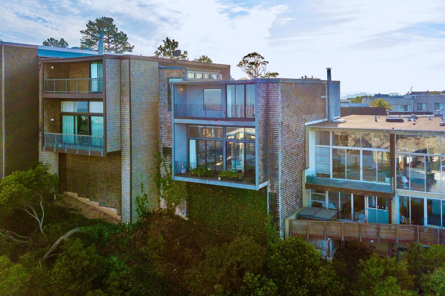 13 Ora Way San Francisco, CA 94131 - Photo 52 of 60 a view of a brick house with a floor to ceiling windows and potted plants