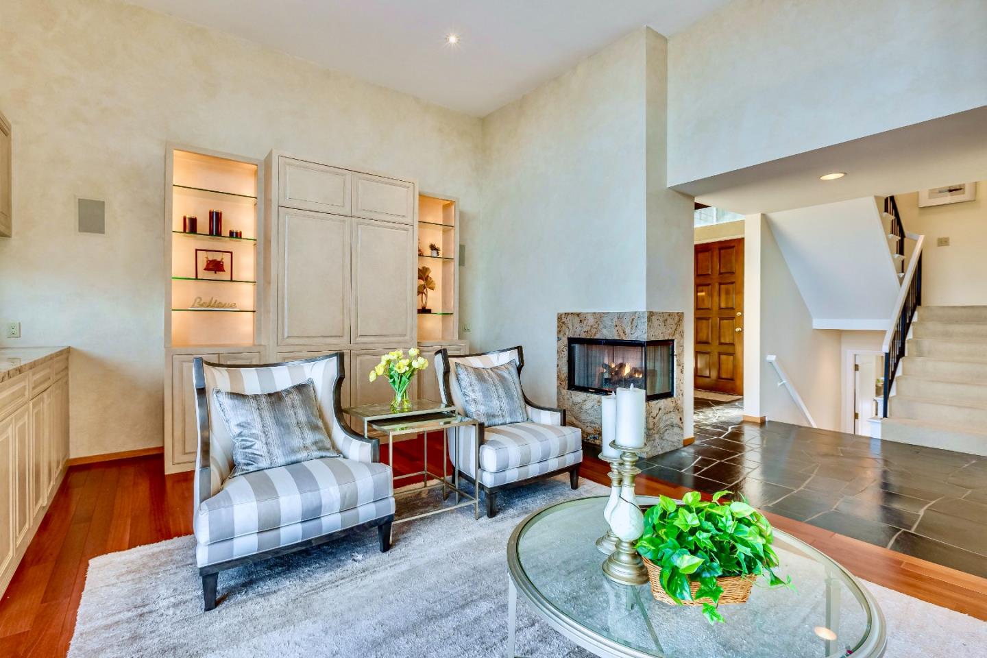 13 Ora Way San Francisco, CA 94131 - Photo 7 of 60 a living room with furniture and a fireplace