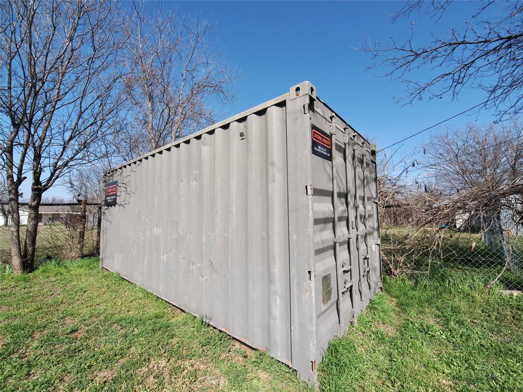 1327 Old Jacksboro Road Graham, TX 76450 - Photo 24 of 33 a view of a back yard of the house