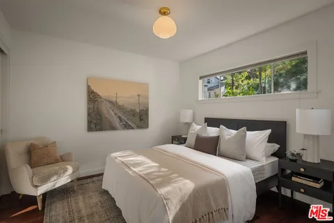 a bathroom with a bathtub and a sink