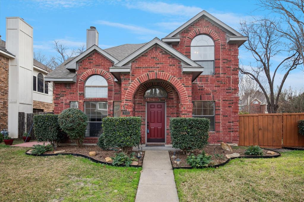 359 Alex Drive Coppell, TX 75019 - Photo 1 of 1 a front view of a house with garden